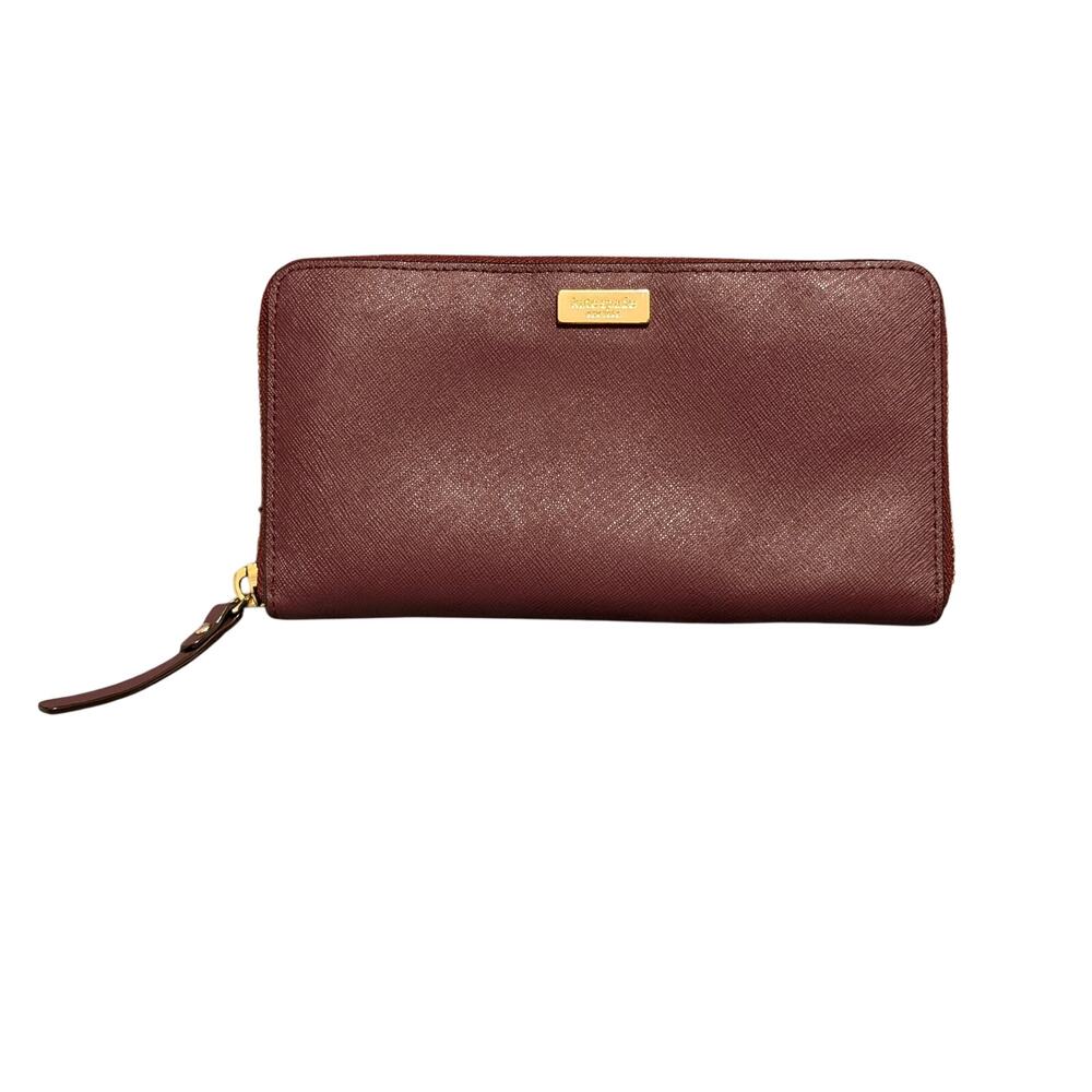 Kate Spade Wrap around zip wallet in Burgandy